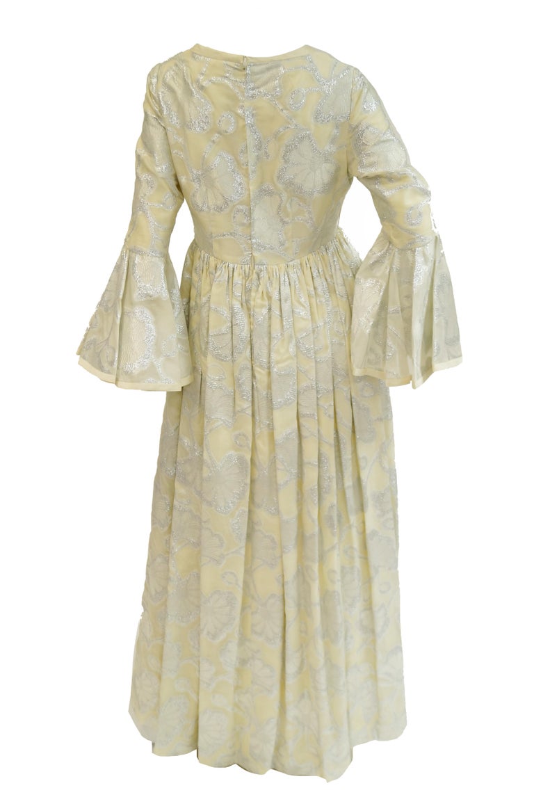 1970s Lisa Meril Cream and Silver Floral Brocade Empire Waist Evening Dress 1970s Lisa Meril Cream and Silver Floral Brocade Empire Waist Evening Dress