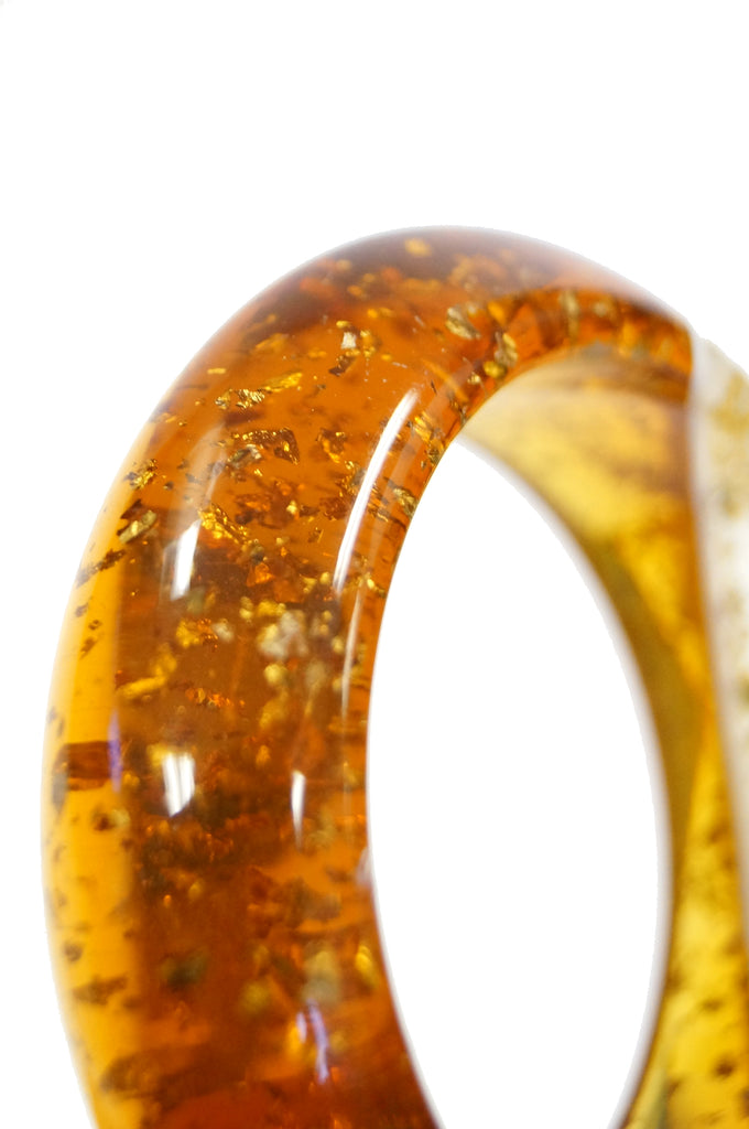 1950s Amber Lucite Bangle with Glitter and Rhinestone Inclusions