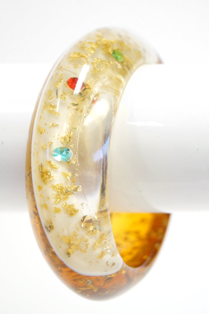 1950s Amber Lucite Bangle with Glitter and Rhinestone Inclusions